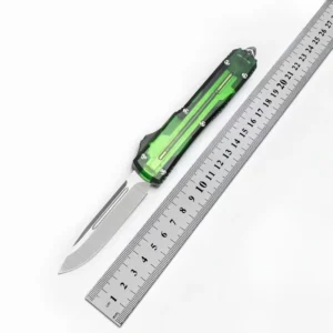 Green translucent handle OTF knife